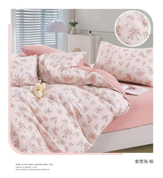 Floral bedding set on a bed with a close-up of the fabric texture.