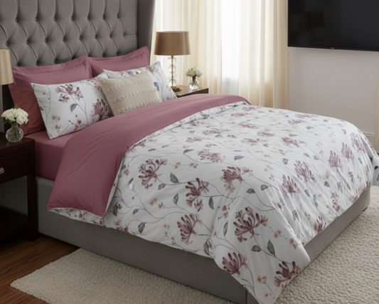 Bedroom with floral bedding and a gray headboard